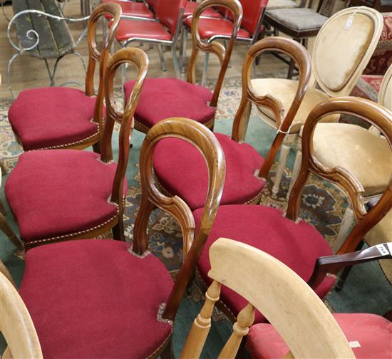 A set of six late 19th century French walnut dining chairs